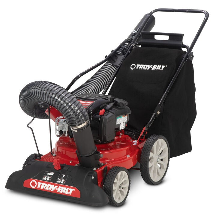Tow-behind 14 HP chipper shredder vacuum with 3-inch branch capacity and 8 cu ft hopper